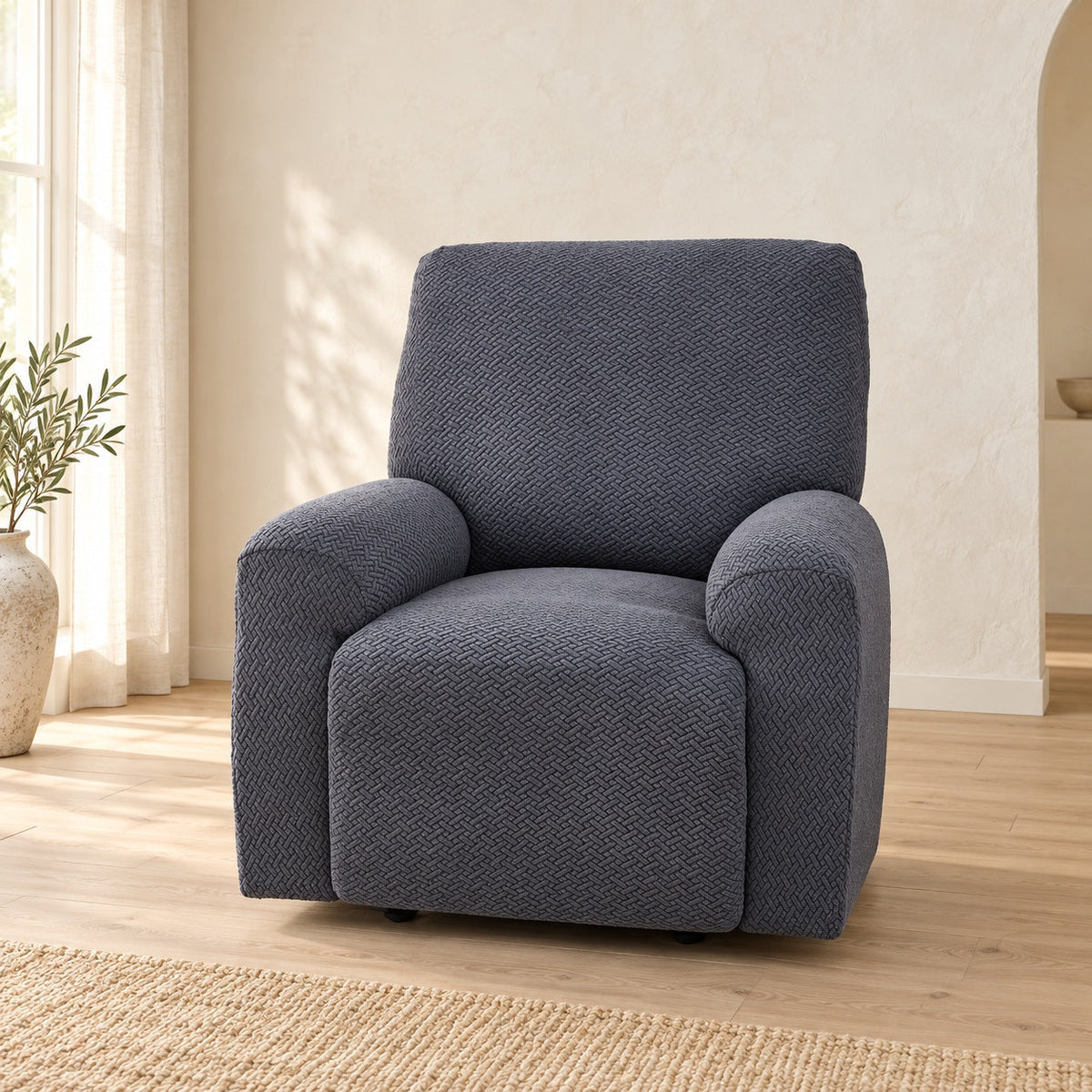 Fauteuil relax habillé d’une housse jacquard gris foncé