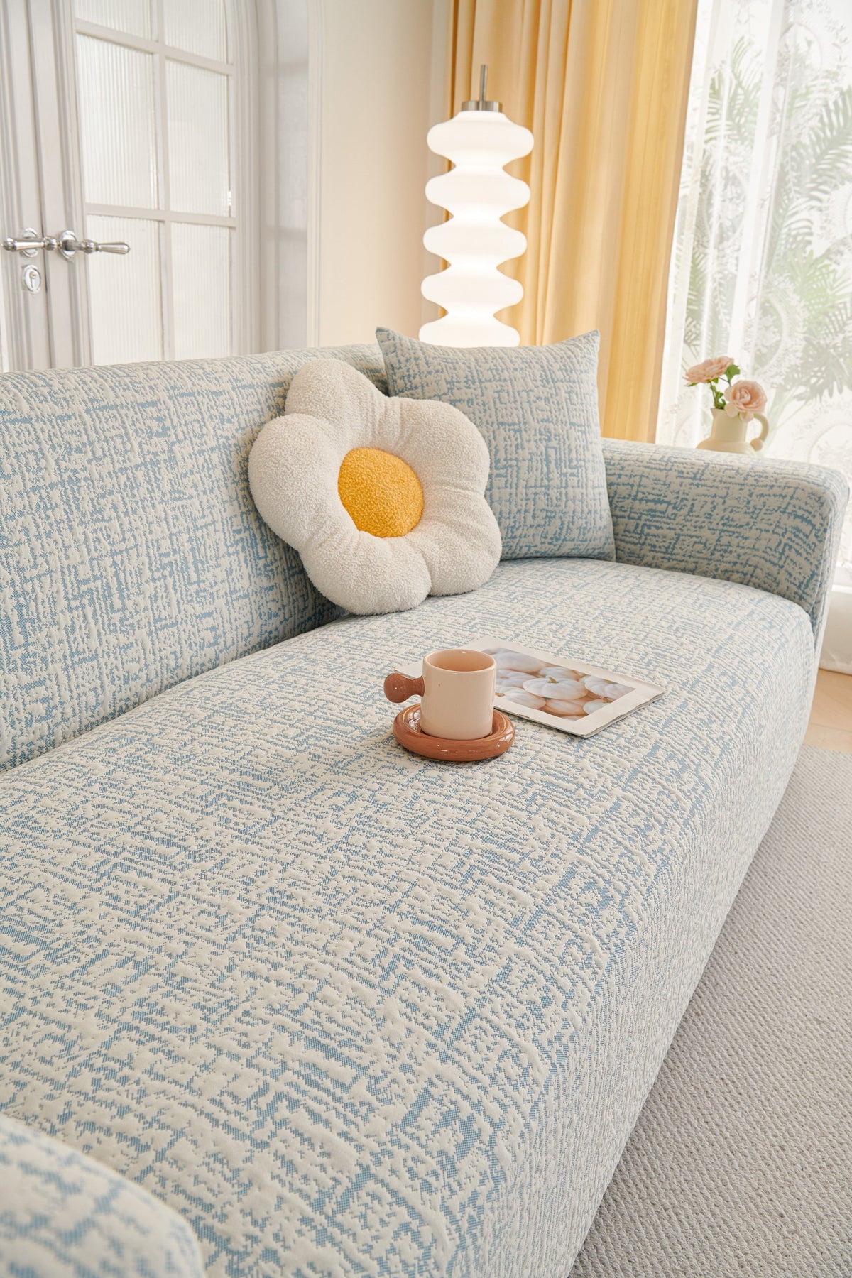 Housse de canapé Gridelle · Bleu · Extensible