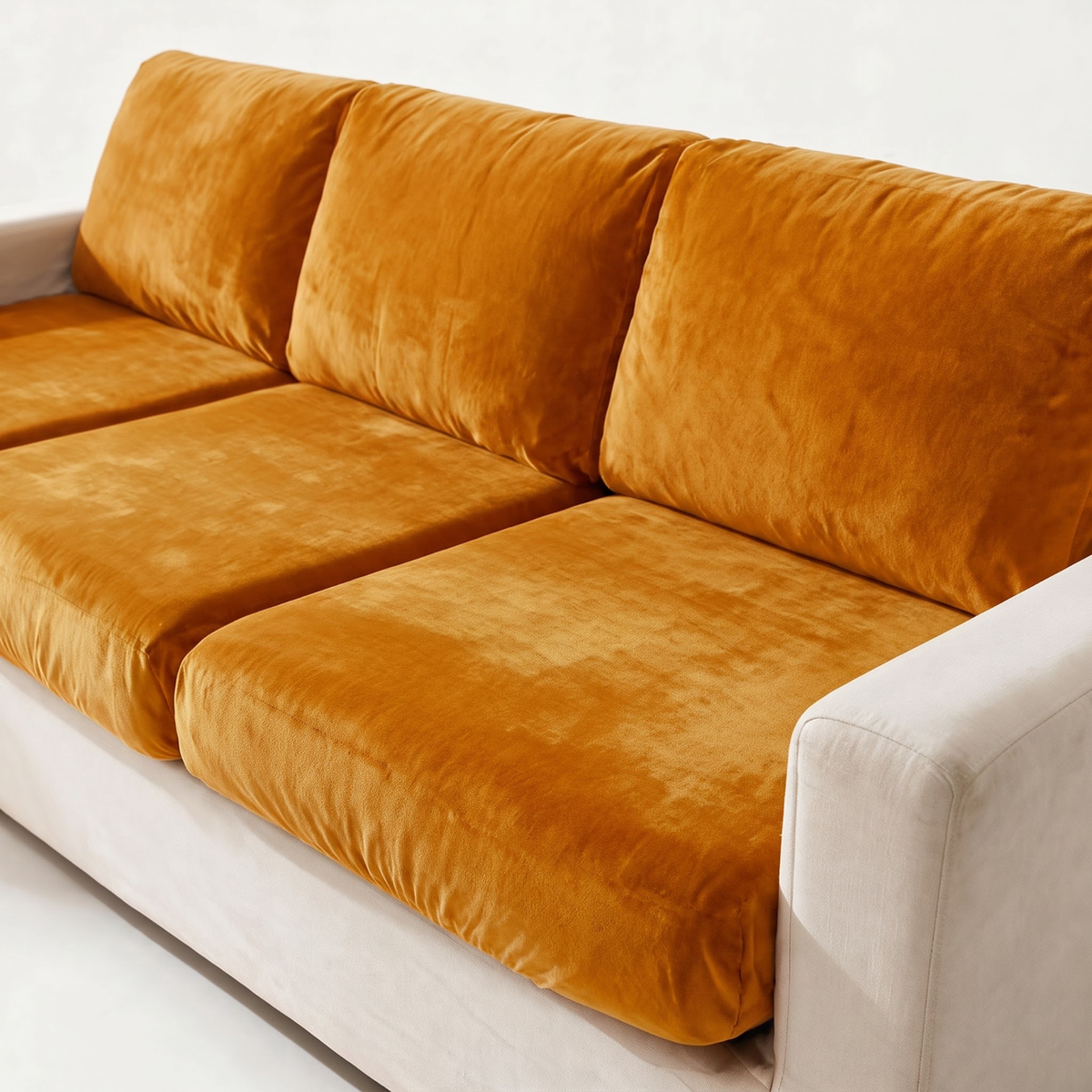 Housse de coussin de canapé Velours · Orange · Extensible — Le tissu et l’ajustement en détail