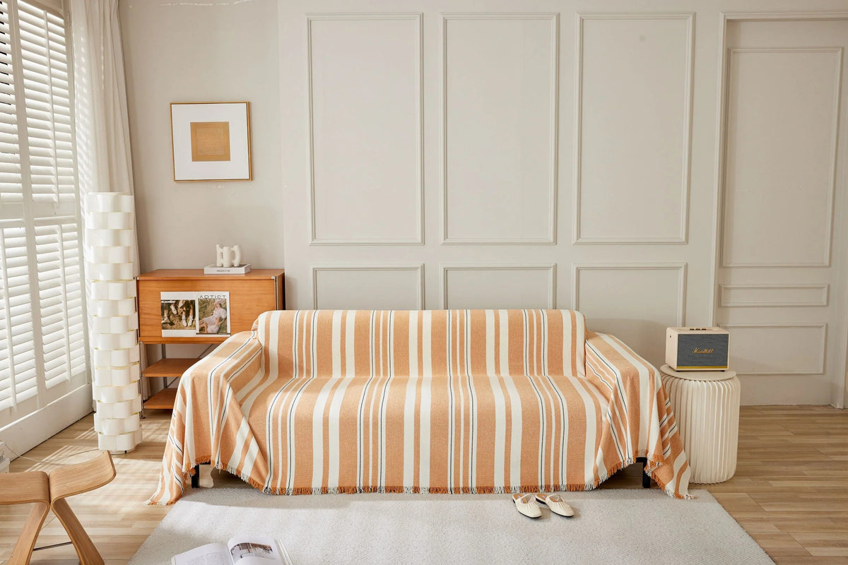 Jeté de canapé Striniara · Orange